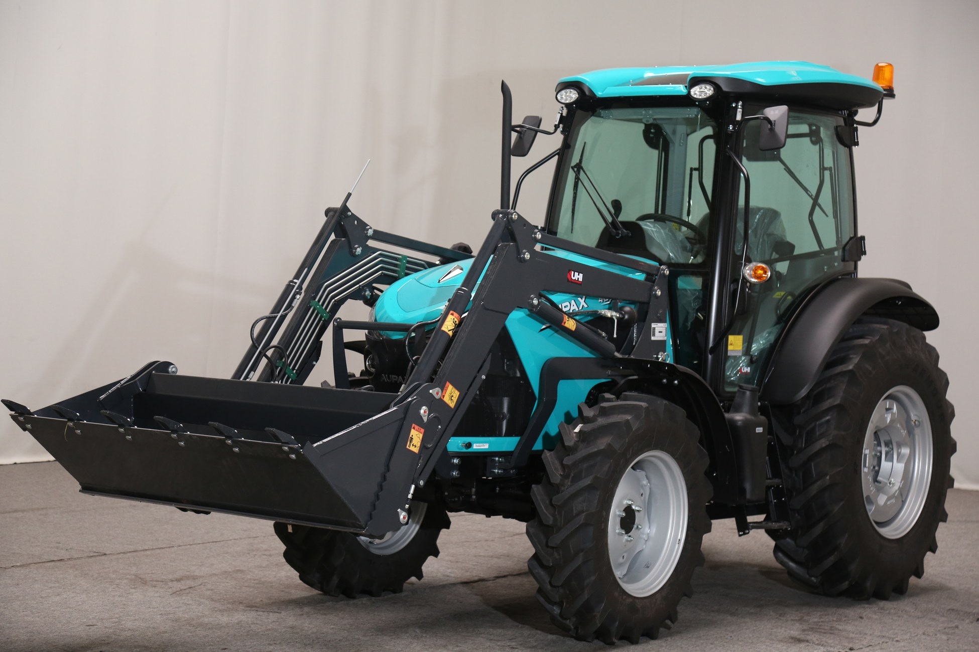 AUPAX 4090-H with TZ08D loader and 4-in-1 bucket